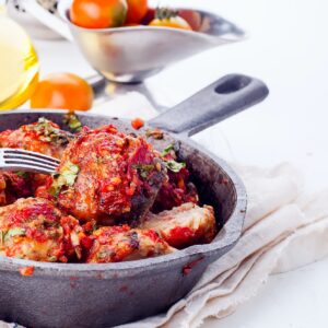 meatballs with tomato sauce in black pan